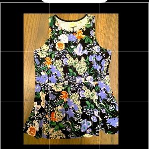 Structured peplum tank, black with flowers.